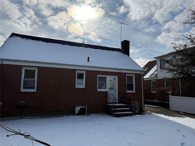 view of snow covered property