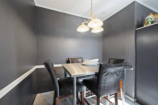 dining room featuring ornamental molding