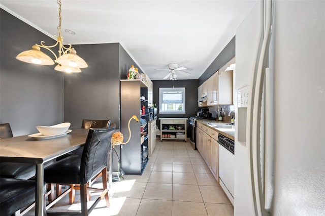 kitchen featuring pendant lighting, decorative backsplash, light tile patterned floors, ceiling fan, and white appliances