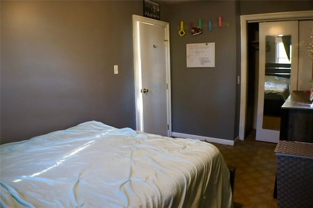 bedroom featuring baseboards