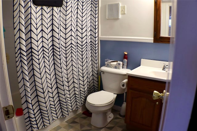 full bath featuring toilet and vanity