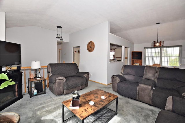 101 Bishop Rd, West Babylon, NY 11704 - living room with lofted ceiling, carpet floors, and baseboards