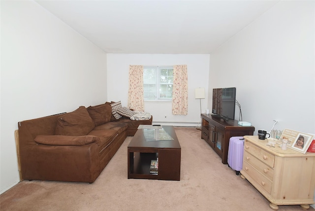 101 Bishop Rd, West Babylon, NY 11704 - living room featuring a baseboard heating unit, light carpet, and baseboards