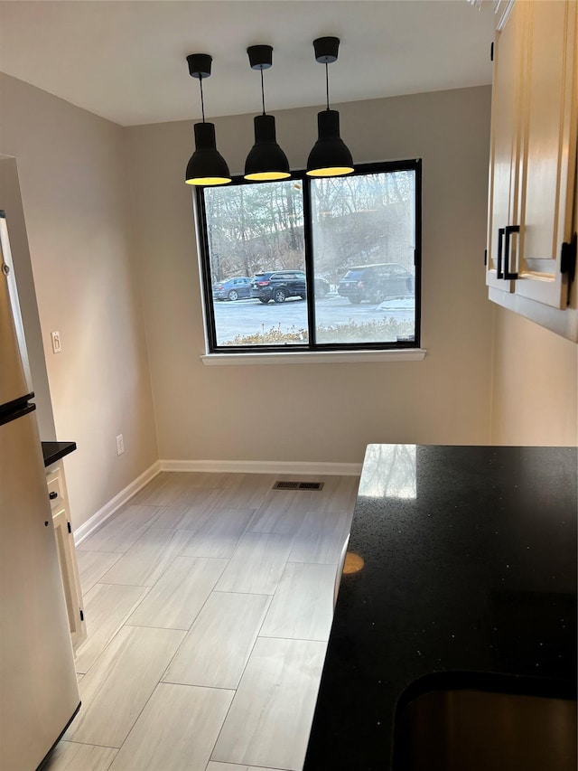 view of unfurnished dining area