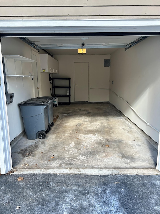 garage featuring a garage door opener