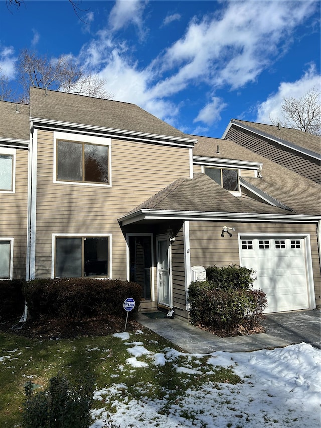 view of front of property featuring a garage