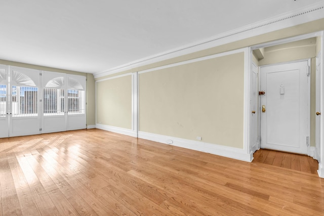 unfurnished living room featuring light wood-type flooring