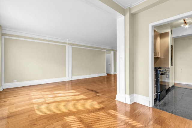 interior space with crown molding and hardwood / wood-style floors