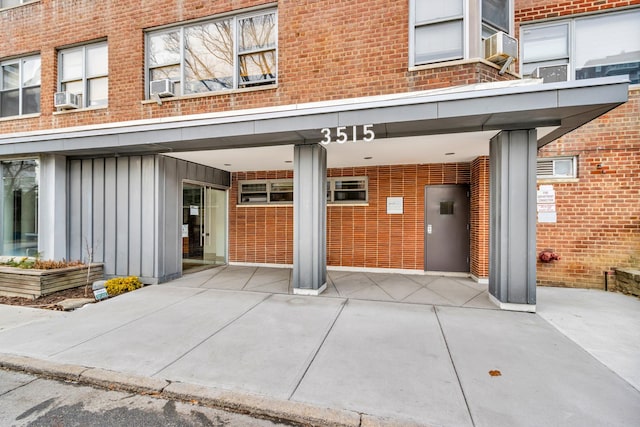 doorway to property with cooling unit