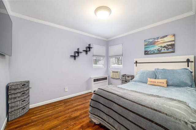 bedroom with ornamental molding, dark hardwood / wood-style floors, and a wall mounted AC