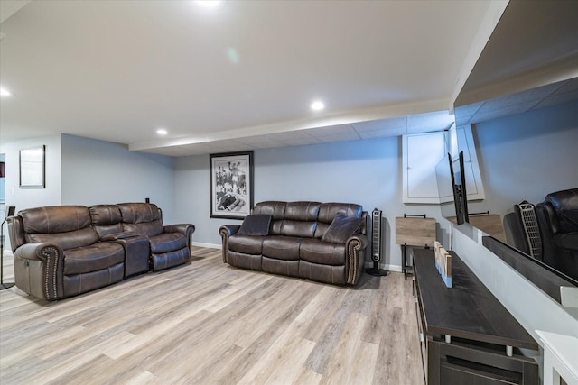 living room with light hardwood / wood-style flooring