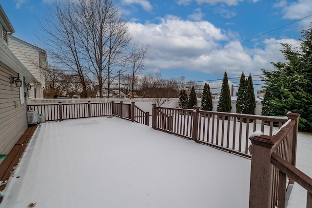 view of snow covered deck