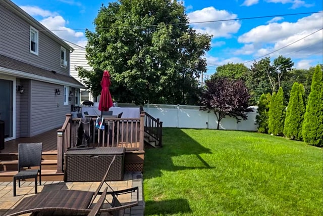 view of yard featuring a deck