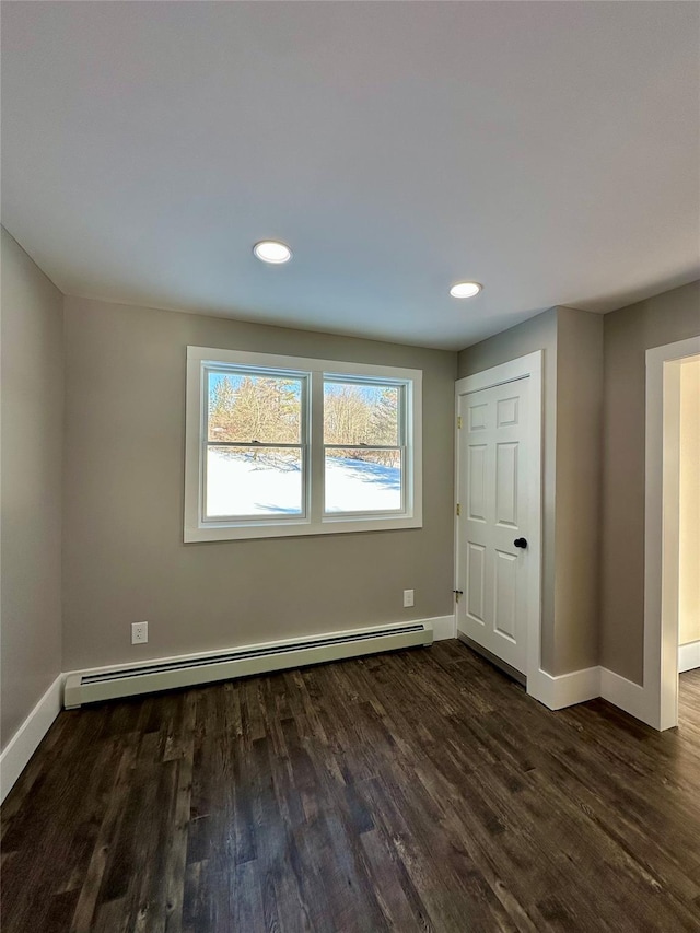 291 Clements Rd, Liberty, NY 12754 - empty room with recessed lighting, dark wood-type flooring, a baseboard radiator, and baseboards