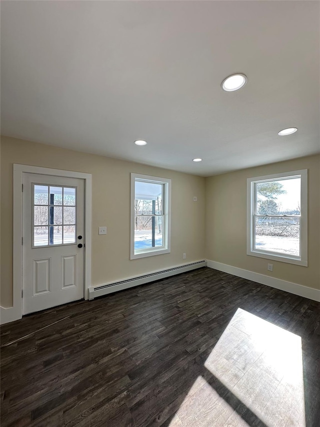 291 Clements Rd, Liberty, NY 12754 - interior space with a baseboard radiator, dark wood-style flooring, baseboards, and recessed lighting