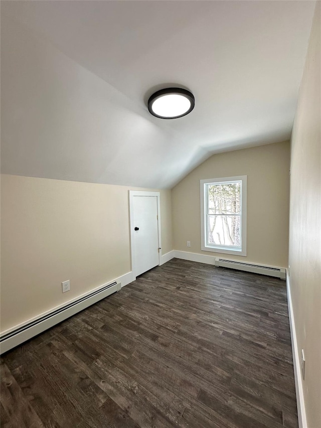 291 Clements Rd, Liberty, NY 12754 - bonus room with dark wood-style flooring, baseboards, a baseboard heating unit, and vaulted ceiling
