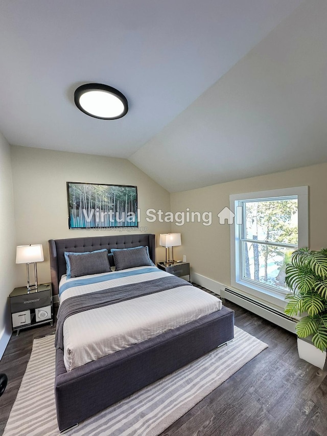 291 Clements Rd, Liberty, NY 12754 - bedroom featuring a baseboard radiator, lofted ceiling, wood finished floors, and baseboards