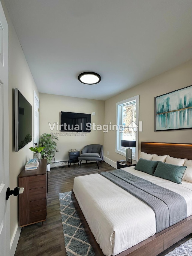 291 Clements Rd, Liberty, NY 12754 - bedroom with dark wood-style flooring and baseboards