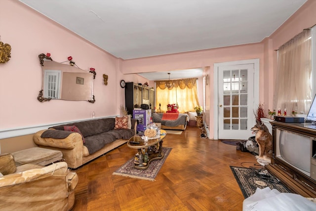 living room featuring parquet flooring