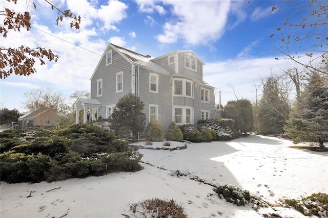 view of snow covered property