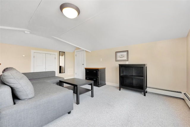 carpeted living room featuring lofted ceiling