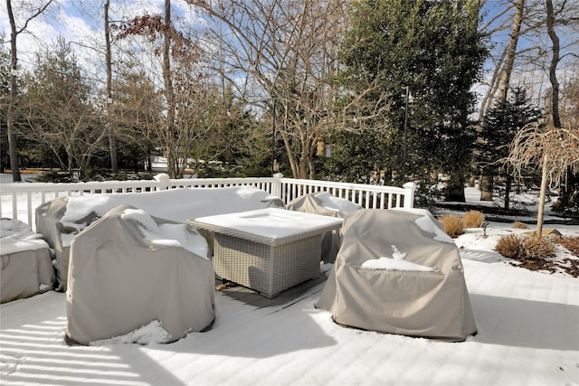 view of snow covered deck