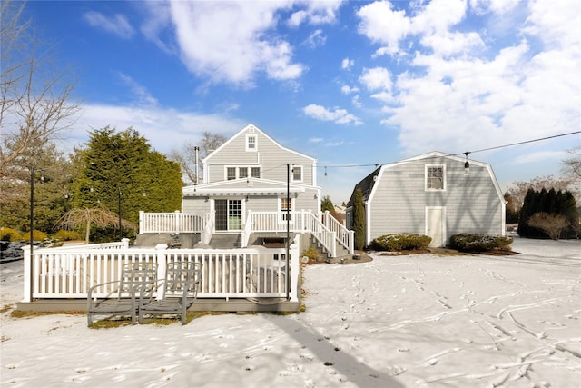 rear view of property with a deck