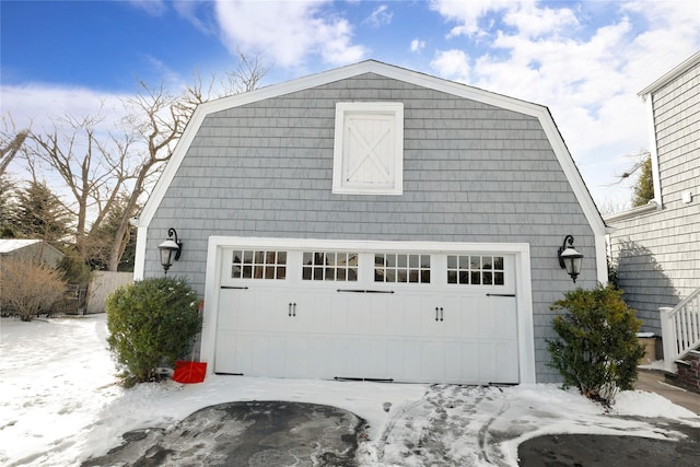 view of snow covered garage