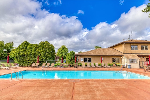 view of pool featuring a patio area