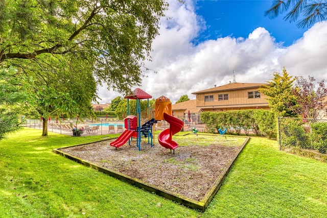 view of play area with a yard