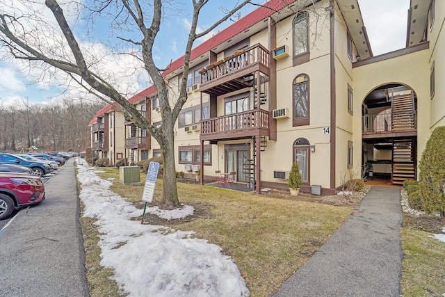 view of property with central AC unit