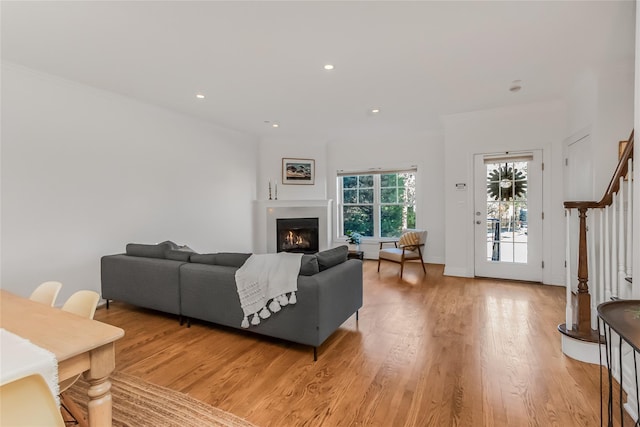 living room with light hardwood / wood-style floors