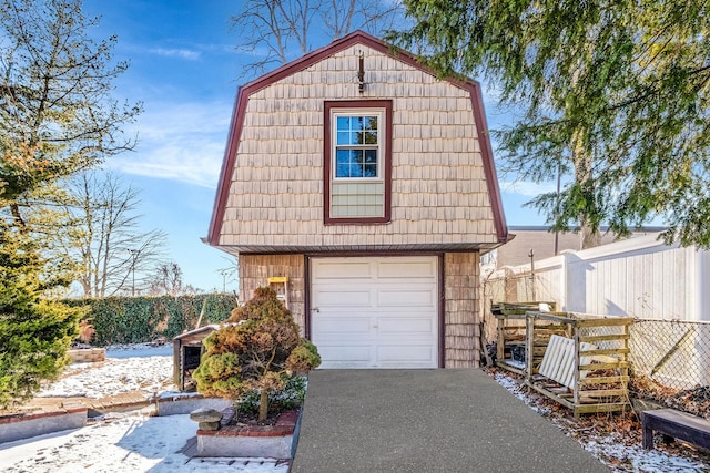 view of snow covered garage