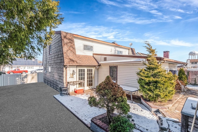 rear view of house with a patio