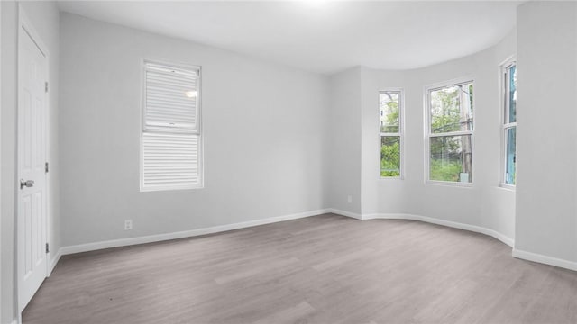 empty room featuring light hardwood / wood-style floors