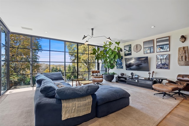 living room featuring hardwood / wood-style flooring and floor to ceiling windows