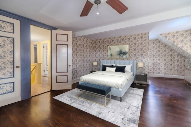 bedroom with dark hardwood / wood-style floors and ceiling fan