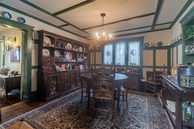 dining area with an inviting chandelier and dark hardwood / wood-style flooring