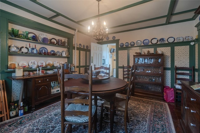 dining space featuring dark hardwood / wood-style floors and a notable chandelier