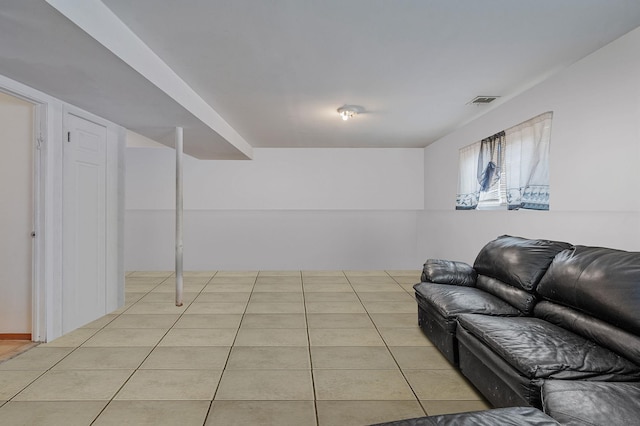 living room with light tile patterned floors