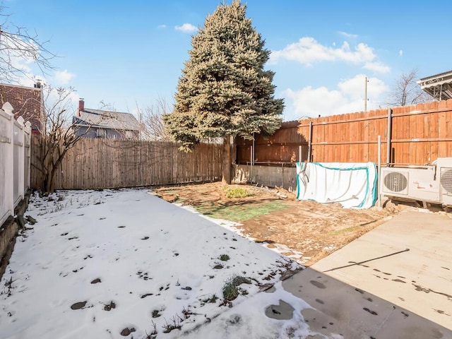 view of yard with ac unit and a patio area