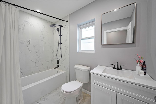 full bathroom featuring tiled shower / bath, vanity, and toilet