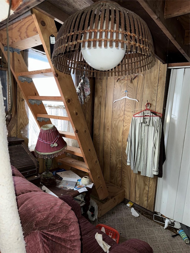 interior space featuring wooden walls