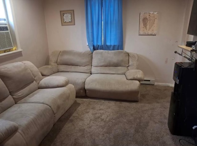 carpeted living room with a baseboard heating unit