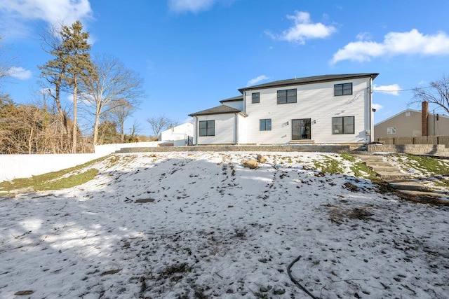 view of snow covered property