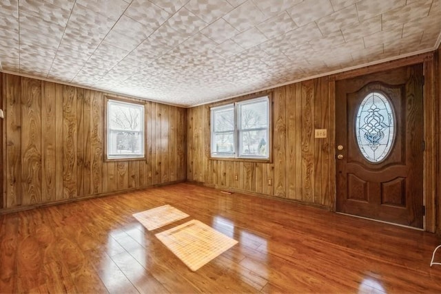 entrance foyer with hardwood / wood-style floors