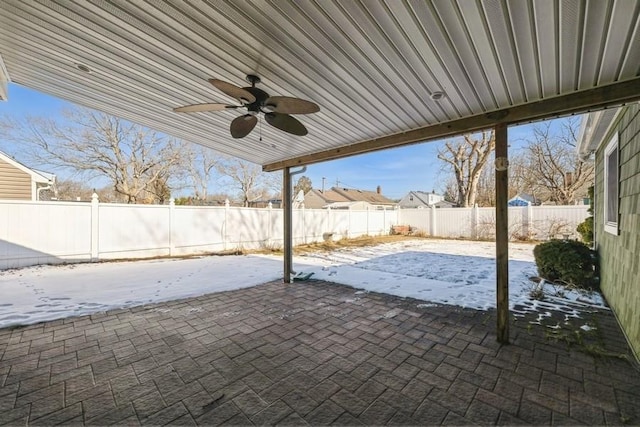 snow covered patio with ceiling fan