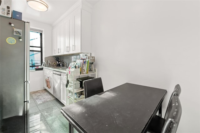 dining room featuring sink