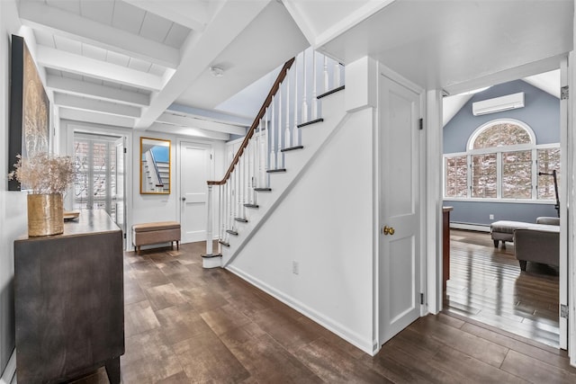 entryway featuring dark wood-style floors, a wall mounted air conditioner, stairway, and baseboards