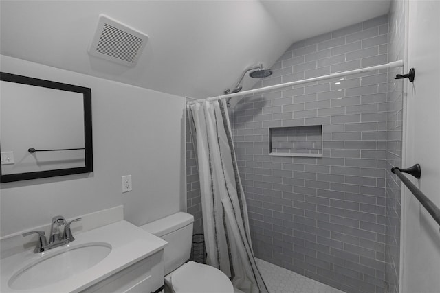 bathroom with vanity, lofted ceiling, curtained shower, and toilet